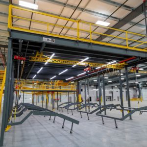 Mezzanine with Straight Stair and Overhead Crane Below Floor