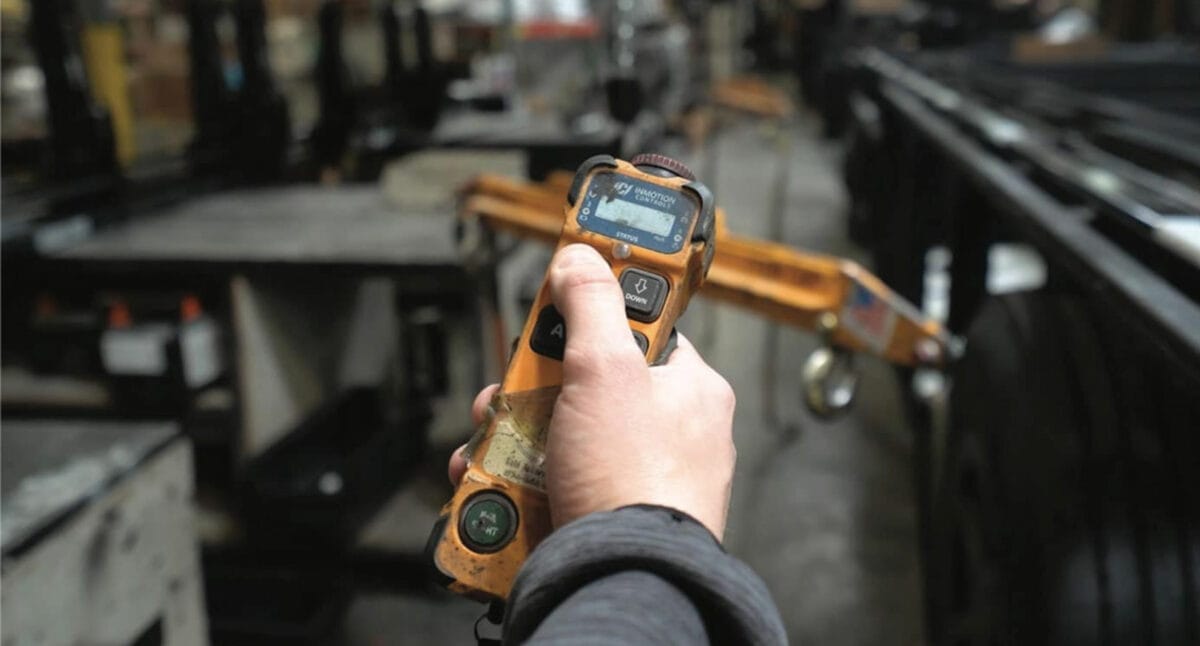 Man Holding Radio Transmitter